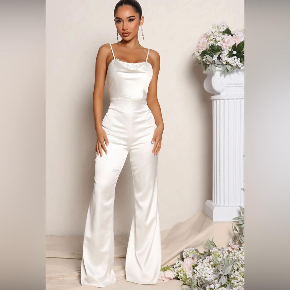 White fashion nova satin jumpsuit. Brand new with tags. Size large